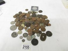 A good collection of old coins including Victorian pennies, cartwheel pennies, 1967 half dollar,