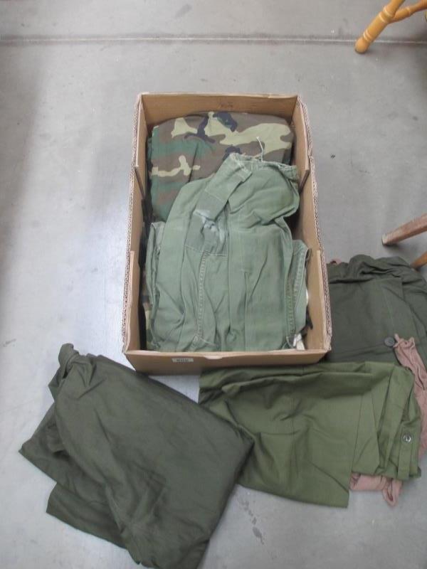 A quantity of military clothing and fatiques