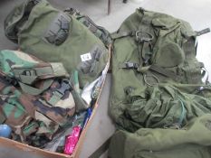 A military backpack, plus smaller backpack,