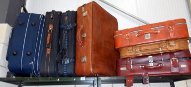 7 various suitcases