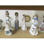 4 NAO by Lladro girl figurines.