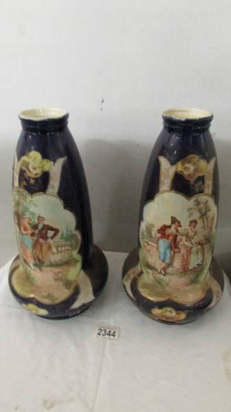 A pair of Victorian vases, 13.5" tall.