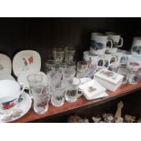 A quantity of car related mugs/cups, glasses,