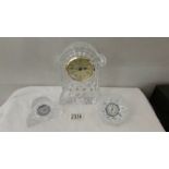 Three Waterford crystal clocks.