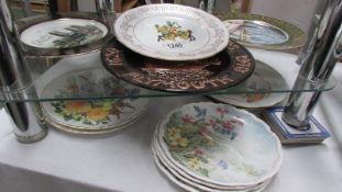 2 shelves of collector's cabinet plates including Royal Albert etc.