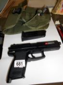 An airsoft pistol in holdall UK postage only ****Condition report**** Postage to