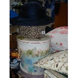 A quantity of hats and hat boxes.