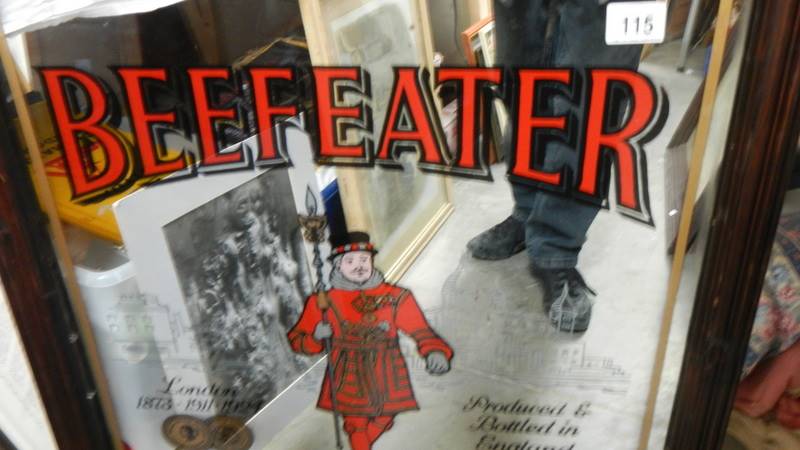A large Beefeater Gin advertising mirror. 64 c 96 cm (collect only). - Image 2 of 2