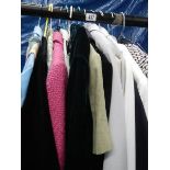 A mixed lot of women's clothes including jacket's, blazers, shirts etc.