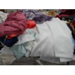 A mixed lot of ladies petticoats, blouses etc.