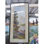 A framed and glazed watercolour - cattle in lake with mountains in background,