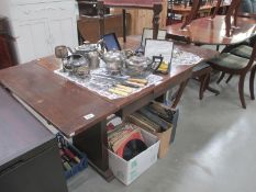 A 1950's oak drawleaf table 86.5cm x 91.5cm and 86.5cm x 145.