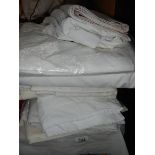 A quantity of white bedlinen etc.