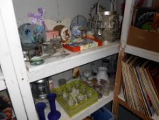 2 shelves of candle items and butterfly ornaments, including pretty hair grips etc.