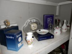 An Edinburgh crystal bell, Aynsley porcelain, glass clock etc.