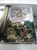 A box of costume jewellery and a quantity of ladies watches