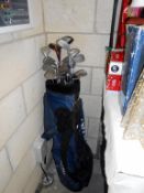 A golf bag and clubs