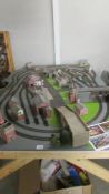 An '00' gauge model railway layout with buildings, table size 134 x 203 cm.