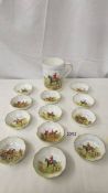 A Royal Crown Derby hunting scene tankard and 12 matching pin dishes.