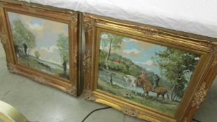 A pair of good quality gilt framed tapestries.