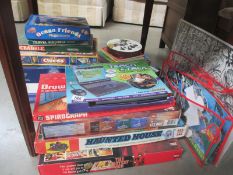 A quantity of vintage games such as Lego Droid, Haunted House, The fastest gun, spirograph,