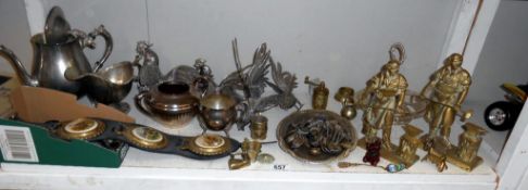 A selection of metalware including brass blacksmiths, silver plated fighting cocks,