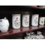 4 Royal Worcester storage jars and a jug with Worcester Herbs decoration