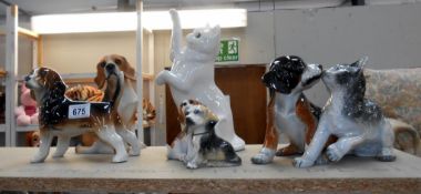 4 dog figurines,