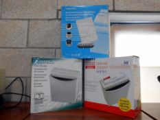 3 boxed paper shredders