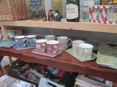 A good lot of William Morris sandwich trays (3 large and 5 small) and 8 mugs,