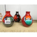 3 Poole pottery vases.