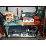 Quantity of hand tools on 2 shelves such as bench grinder, Bosch planer, orbital sander drill bits,