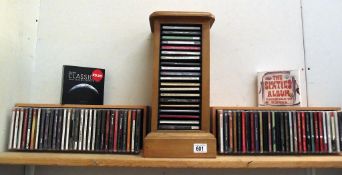 3 CD holders and 80+ CD's including Andrew Rieu, Elvis, Willie Nelson, Don Williams, Rose Marie,