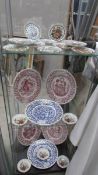 3 shelves of collector's cabinet plates including 12 days of Christmas, Norman Sherman etc.