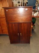 A vintage dark wood stained drinks cabinet 66cm x 34cm x height 109cm