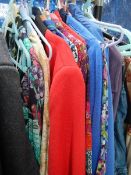 A quantity of women's clothing including shirts, fleeces, jeans etc',
