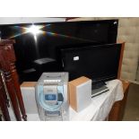 A 42" Phillips tv, Kodak dvd player, Daewoo music centre and a 21" Toshiba Tv,