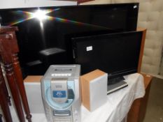 A 42" Phillips tv, Kodak dvd player, Daewoo music centre and a 21" Toshiba Tv,