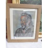A framed and glazed pastel portrait entitled 'Roger',