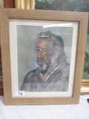 A framed and glazed pastel portrait entitled 'Roger',