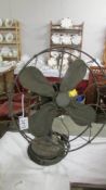 A vintage industrial cooling fan.