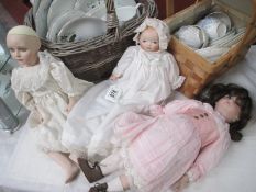 3 porcelain dolls,