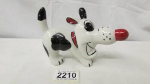 A Lorna Bailey Pottery 'Dashy the dog', 10 cm tall x 15 cm long, signed to base.
