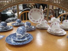 4 Wedgwood trios and a 15 piece Royal Malvern Roses teaset