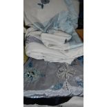 A quantity of silk style bedlinen.