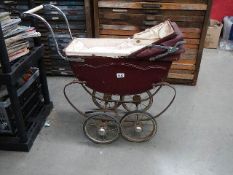 A vintage dolls pram, a/f.