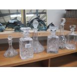6 decanters including Stuart crystal and Thomas Webb,