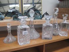6 decanters including Stuart crystal and Thomas Webb,