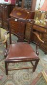 An early 20th century elbow chair.