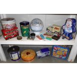 2 shelves of assorted collectors tins etc.